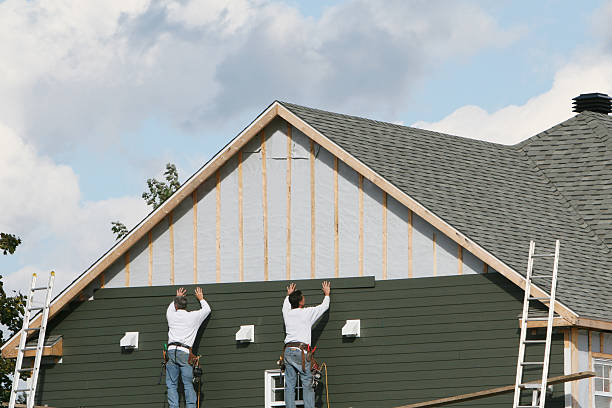 Professional Emergency Siding Repair technician working in Broomes Island, MD